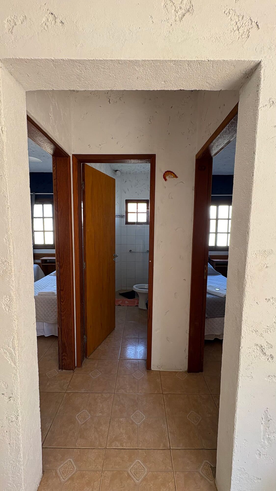 entrada quartos e banheiro